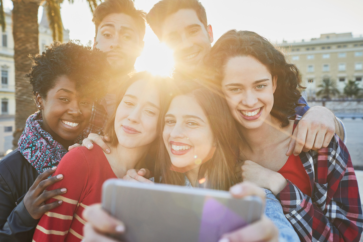 Diverse Group of Millennials taking a Selfie
